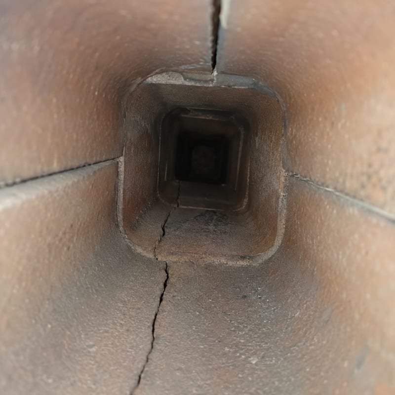 Cracked clay flue tile seen from inside the chimney during a chimney inspection in Syracuse, NY